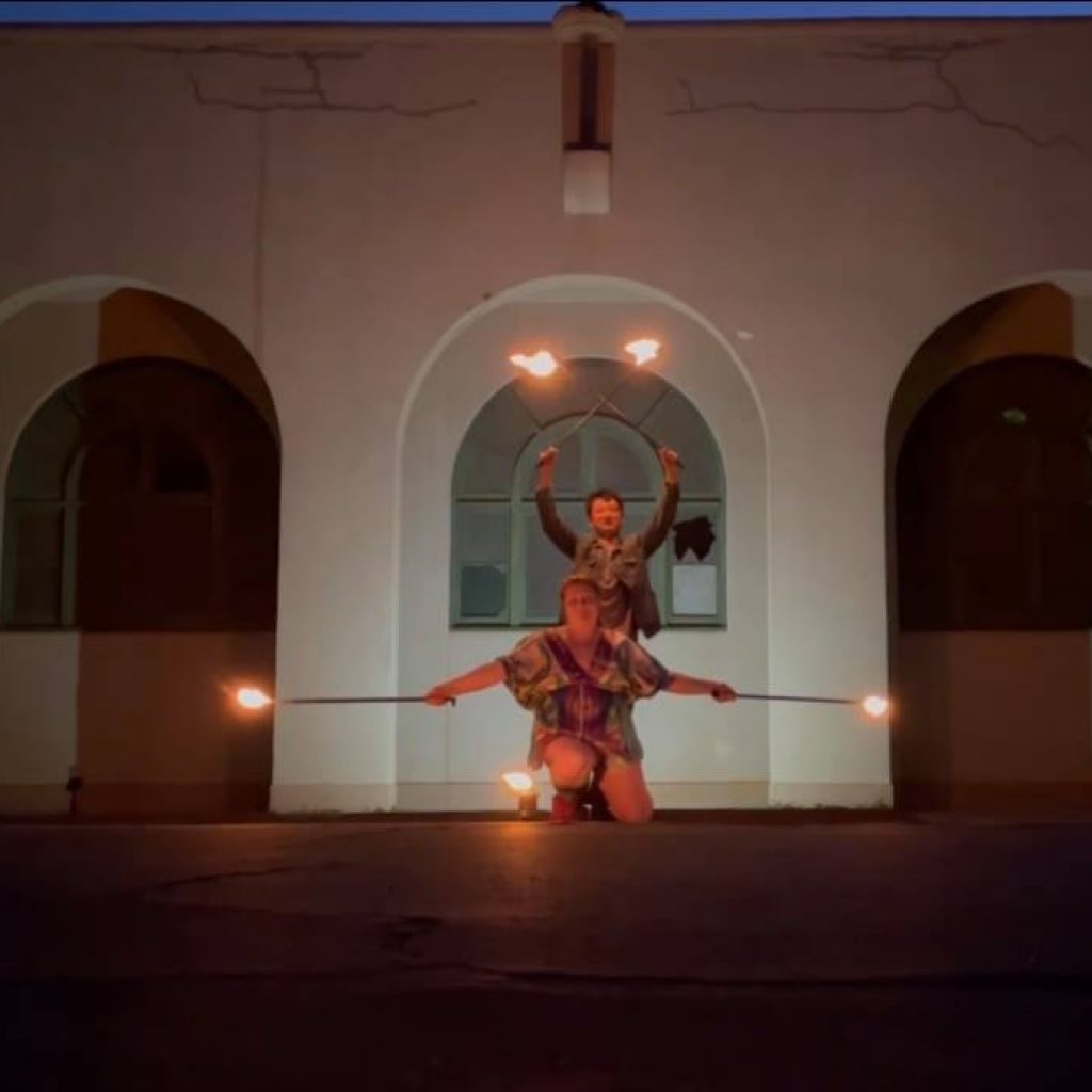 My dance partner and I posing with our torches