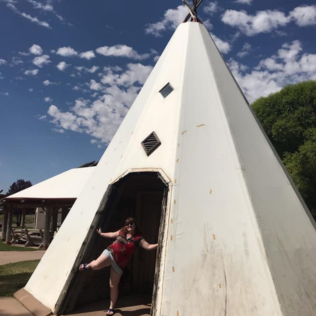 Me standing by the wigwam hotel