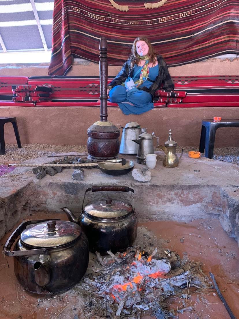 Me sitting by bedouin tea pots