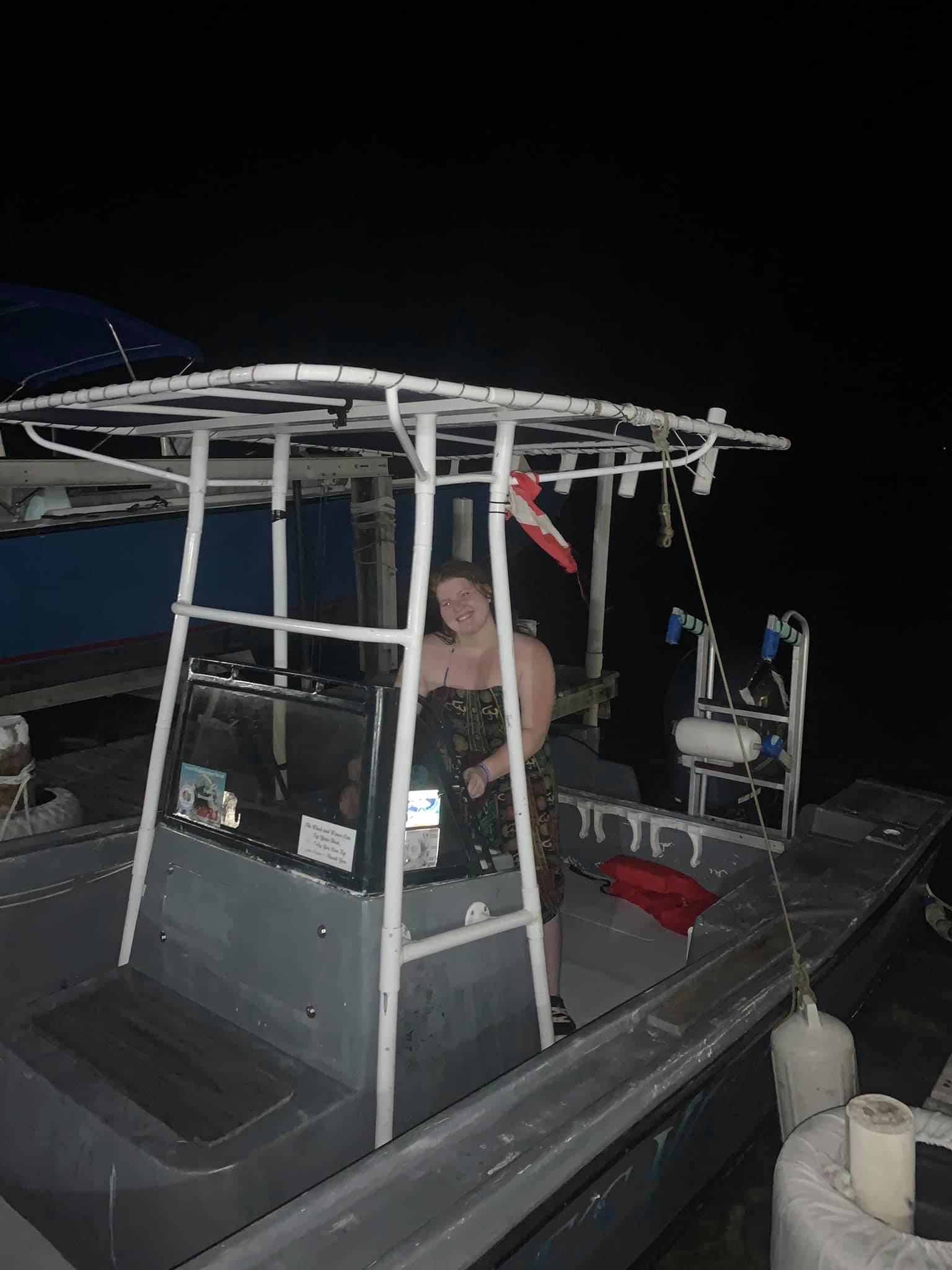 Me on a boat at night