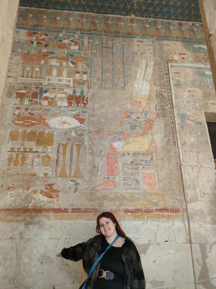 Me standing in front of queen hatshepsut's hieroglyphics