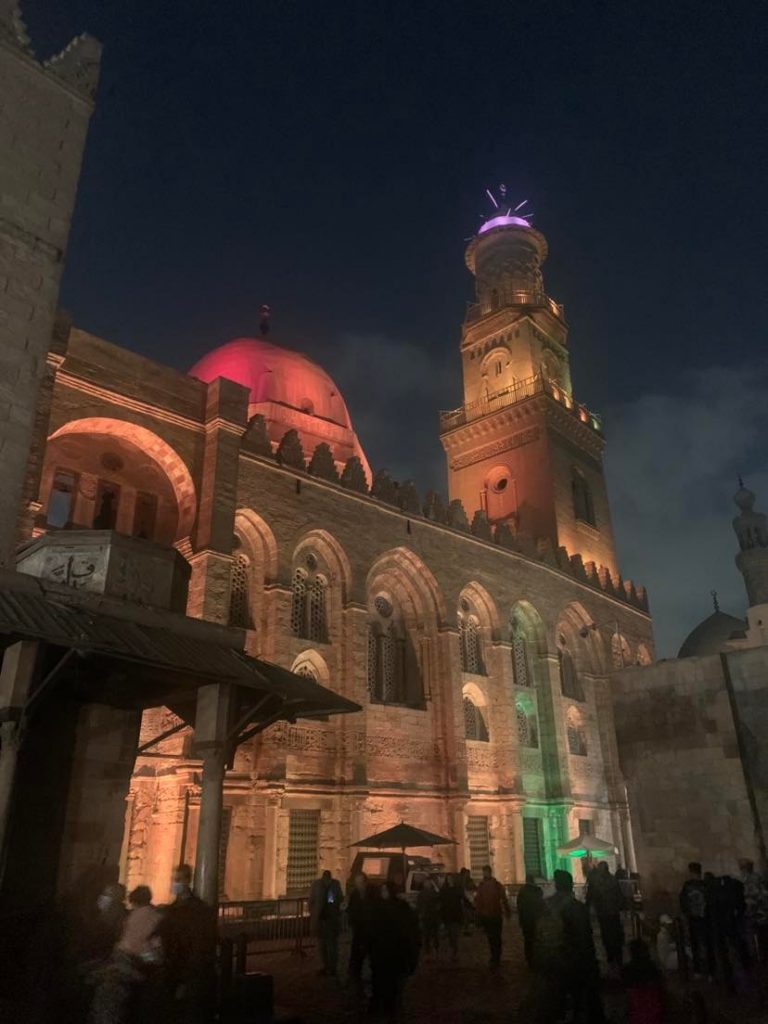 A mosque lighting up at night