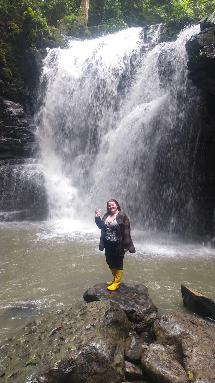 Me posing by the waterfall