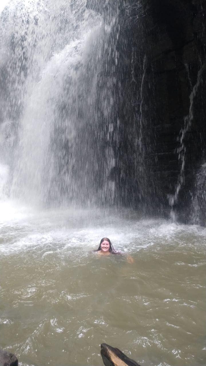 Me swimming in the waterfall