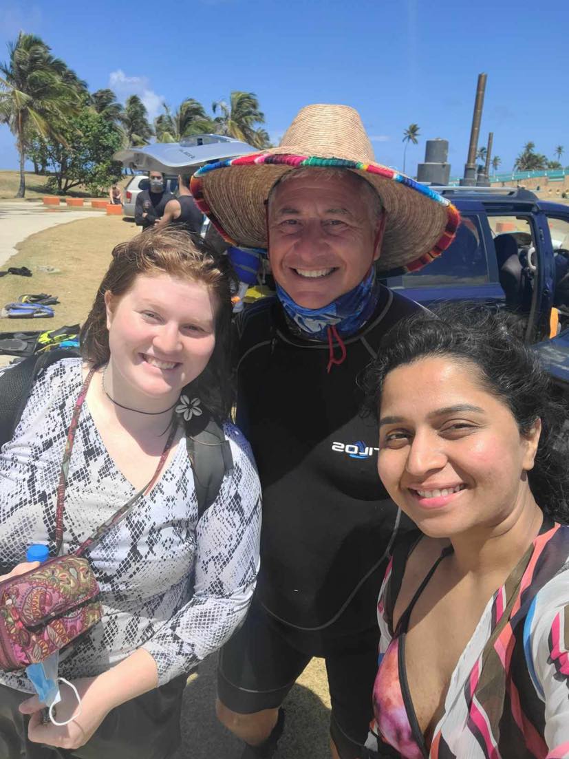 Me posing with scuba instructor and new friend