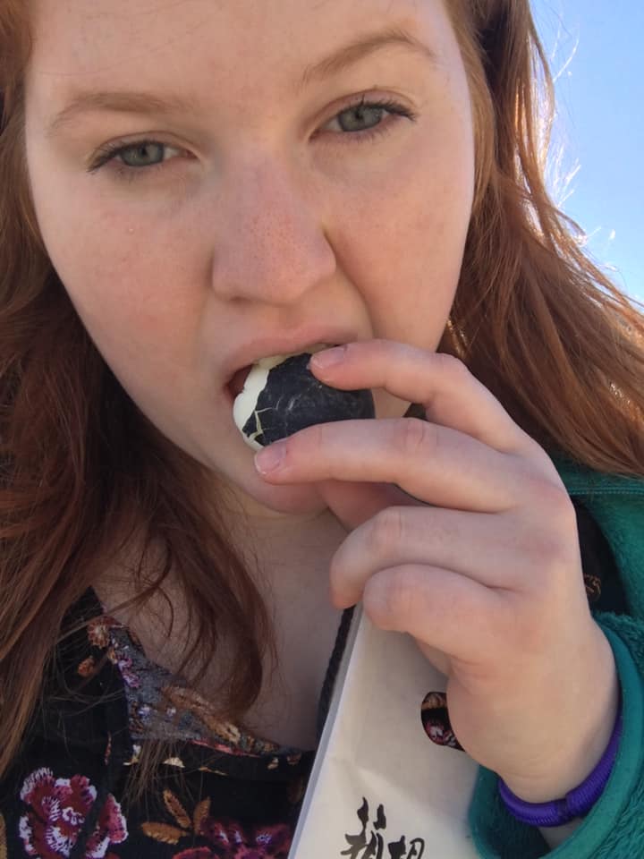 Me eating a black egg