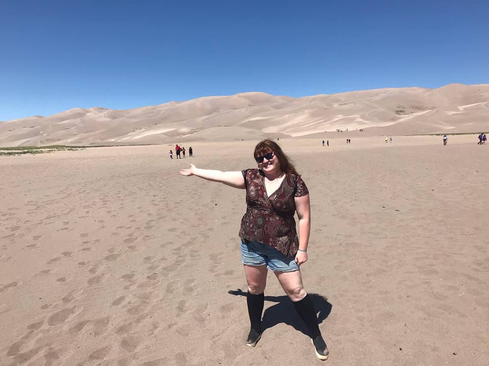 Me in front of sand dunes at Great Sand Dunes National Park 