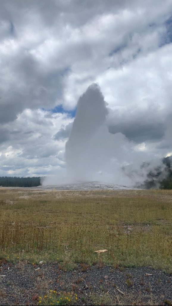 Old Faithful erupting at Yellowstone National Park 